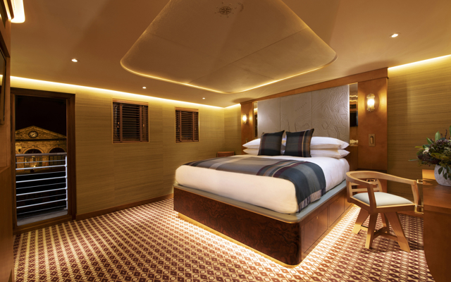 Super king size bed with under bed lighting in Fingal's Hyskeir luxury cabin room at 5 star hotel Edinburgh