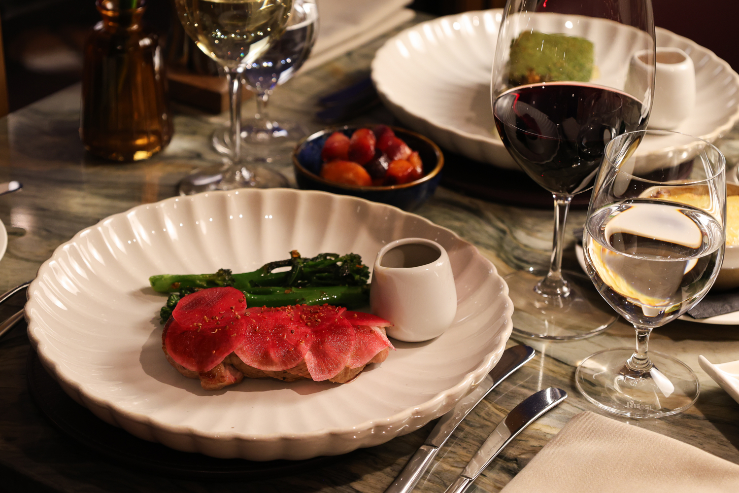 Roasted Devon duck breast, sweet-marinated mooli, broccolini, sauce bigarade 