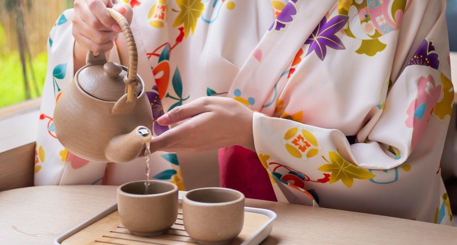 Woman pouring tea.