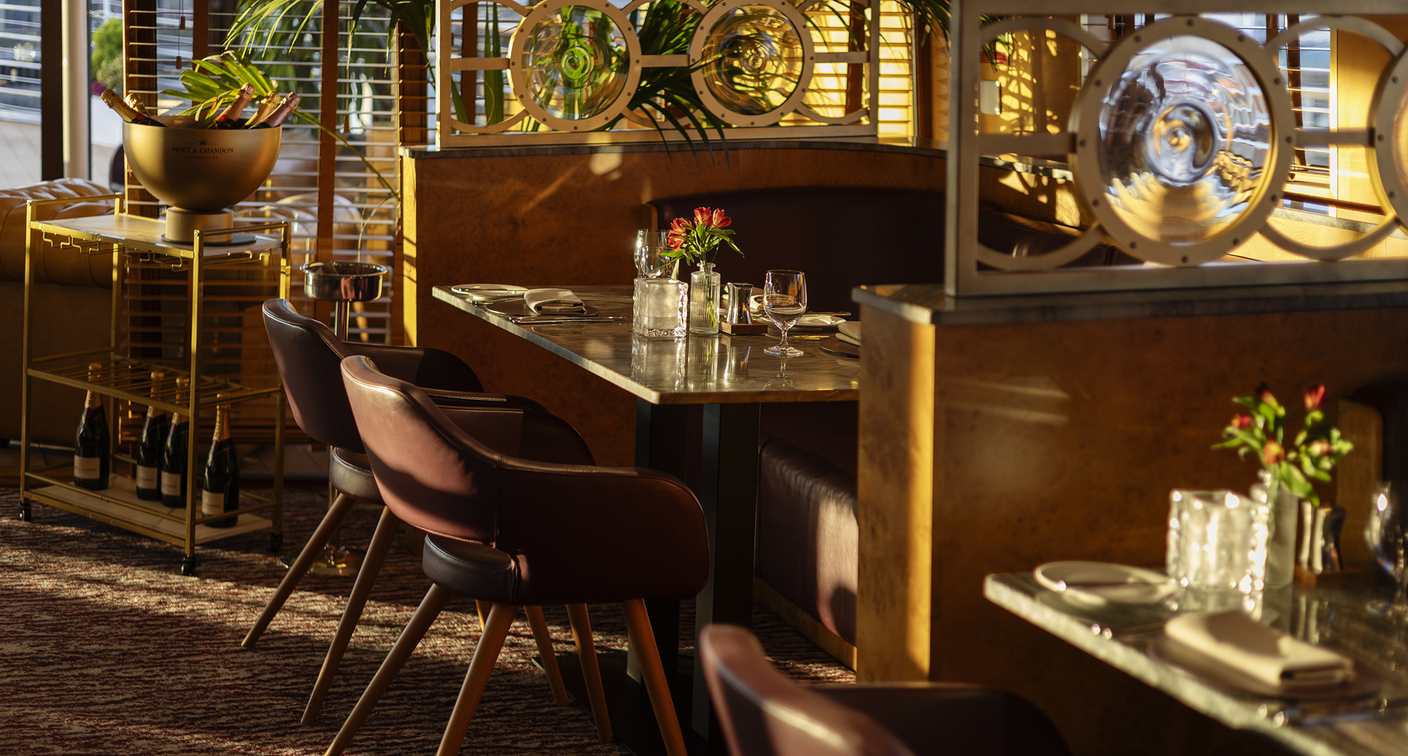 Golden sunlight bathing inside The Lighthouse Restaurant. 