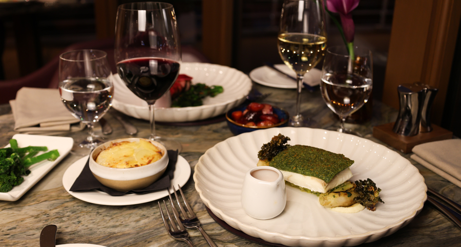 Loch Fyne halibut, herb crust, Jerusalem artichoke, variegated kale, sauce chermoula